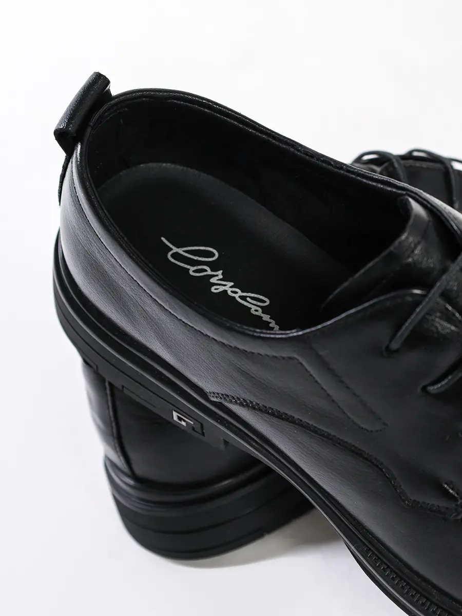 Туфли черного цвета на низком каблуке